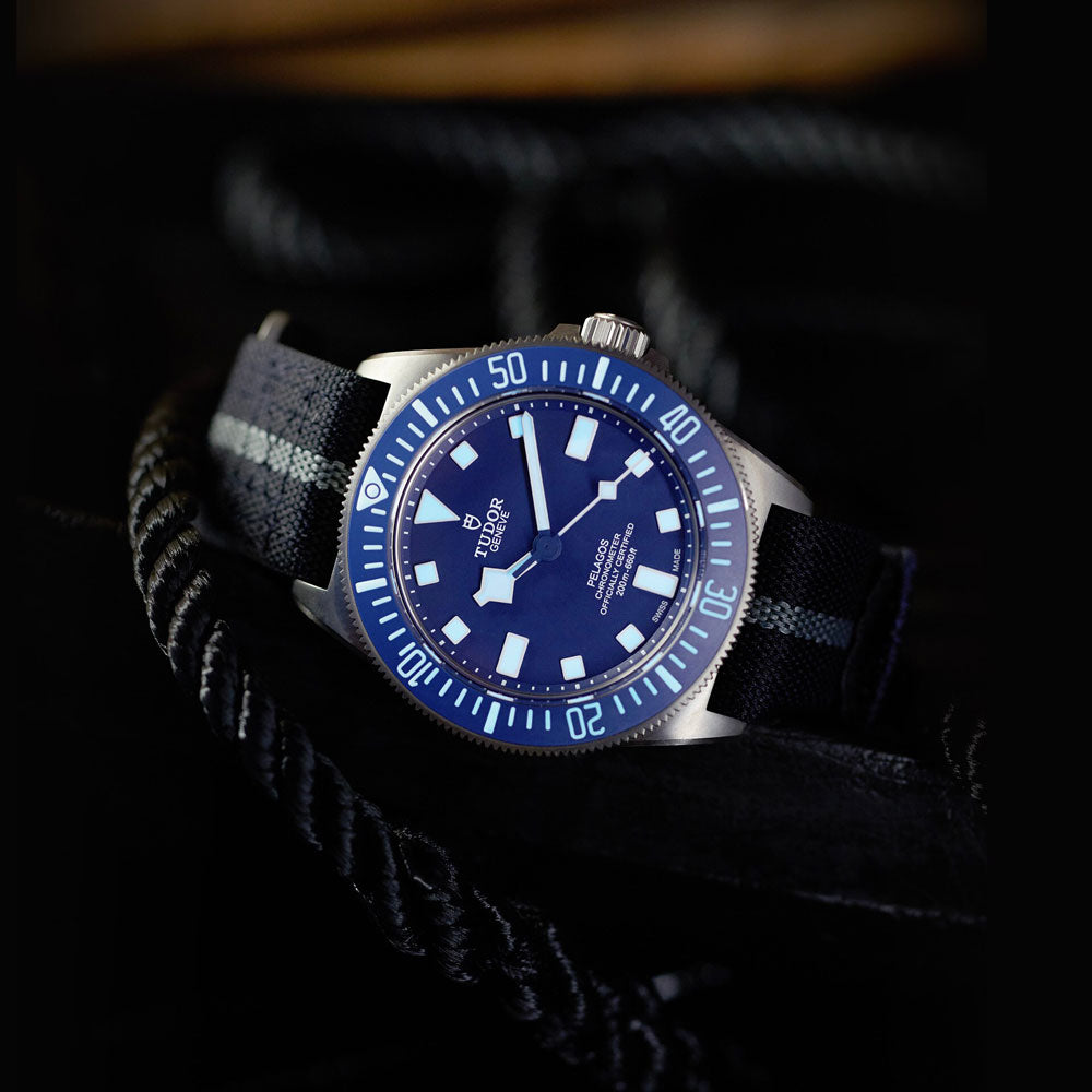tudor pelagos fxd 42mm blue dial automatic titanium on fabric strap watch lifestyle image
