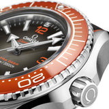 omega seamaster planet ocean 6000m 45.5mm grey dial o-megasteel on rubber strap automatic watch showing bezel closeup