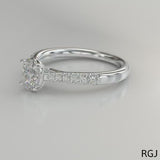 The Skye Classic Platinum 0.50ct Oval Cut Diamond Solitaire Engagement Ring With 0.20ct Diamond Set Shoulders