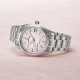 grand seiko pink snowflake spring drive 20th anniversary limited edition 41mm pink dial steel on steel bracelet automatic watch lifestyle image