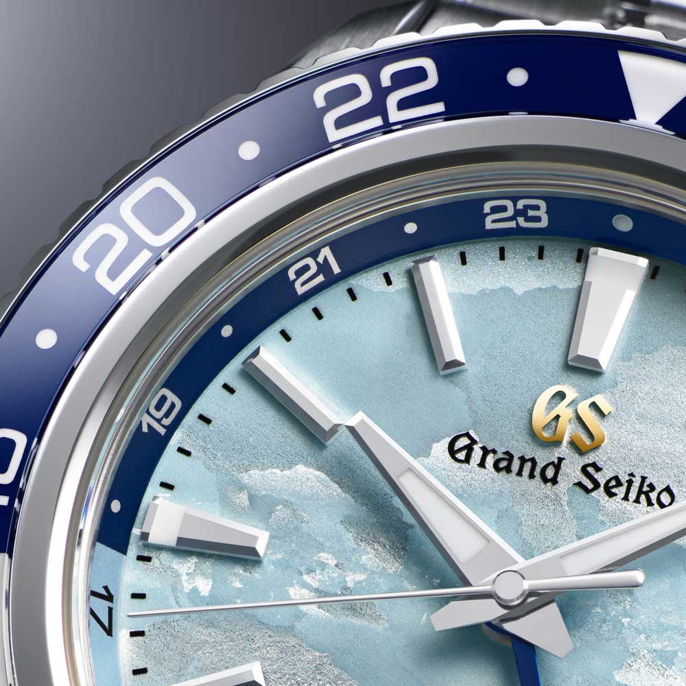 grand seiko unkai sea of clouds hi-beat gmt limited edition 40mm sky blue dial automatic watch on a steel bracelet dial closeup image