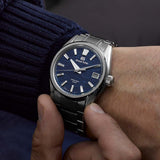 grand seiko evolution 9 spring drive suwa lake 40mm blue dial titanium gents watch wrist shot