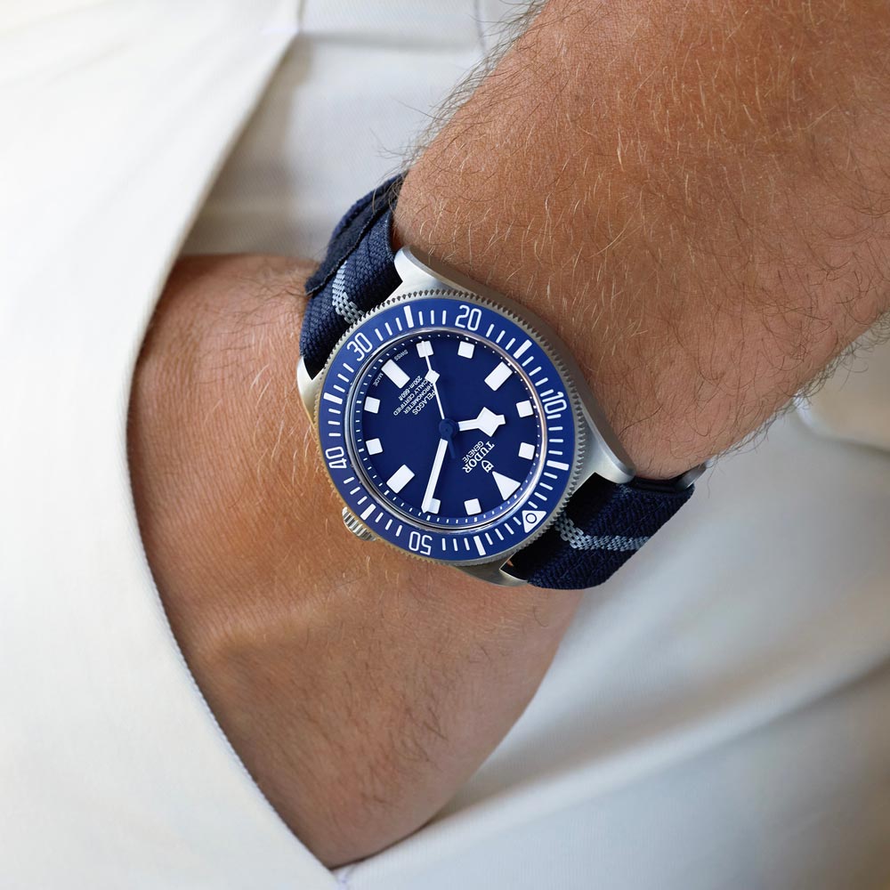 tudor pelagos fxd 42mm blue dial titanium on fabric strap automatic watch lifestyle image