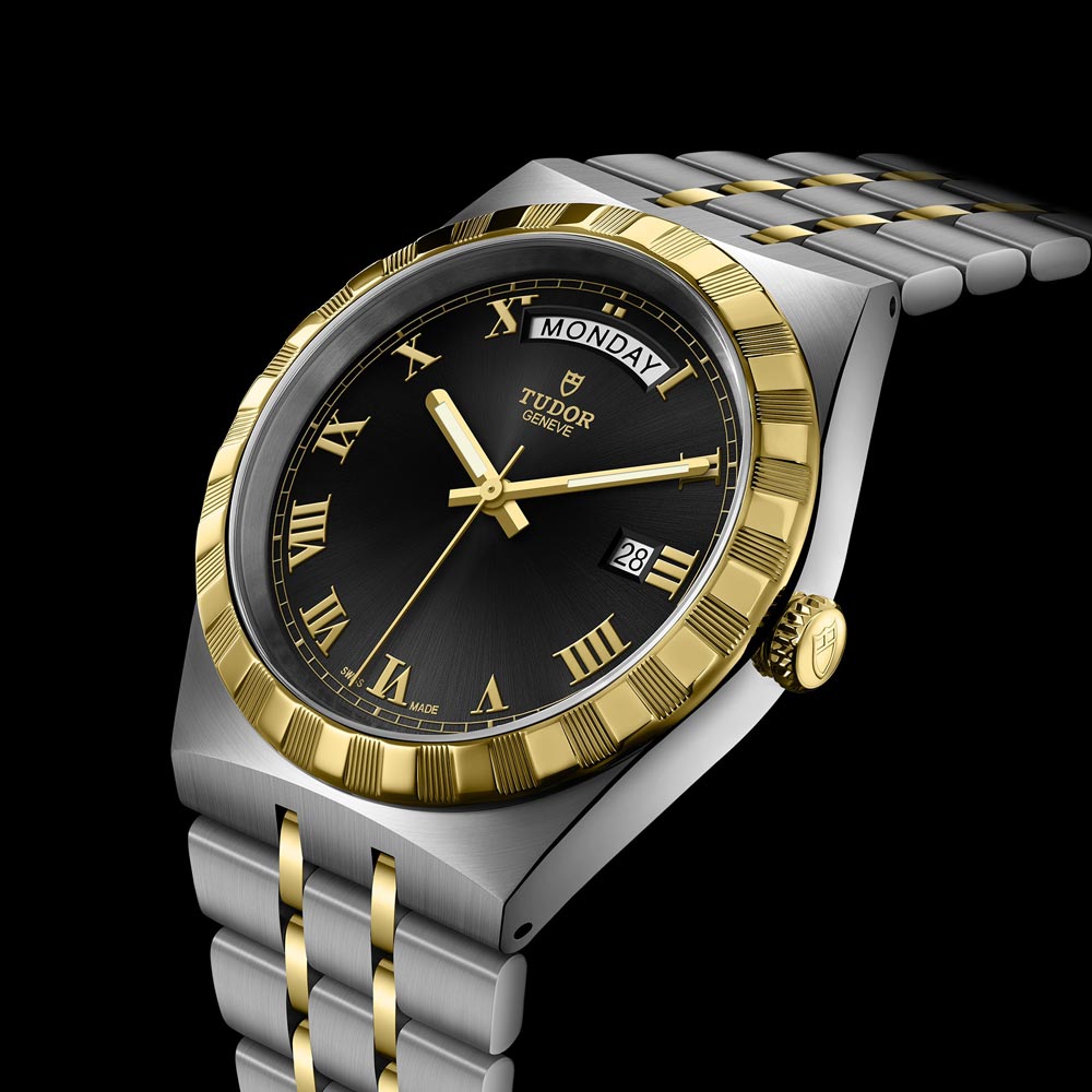 tudor royal 41mm black dial gold and steel on steel and gold bracelet automatic watch lifestyle image