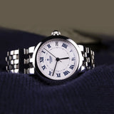 tudor clair de rose 26mm opaline diamond dot dial automatic steel on steel bracelet watch lifestyle image