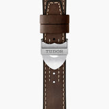 tudor black bay p01 42mm black dial steel on leather strap automatic watch showing brown leather strap with folding clasp