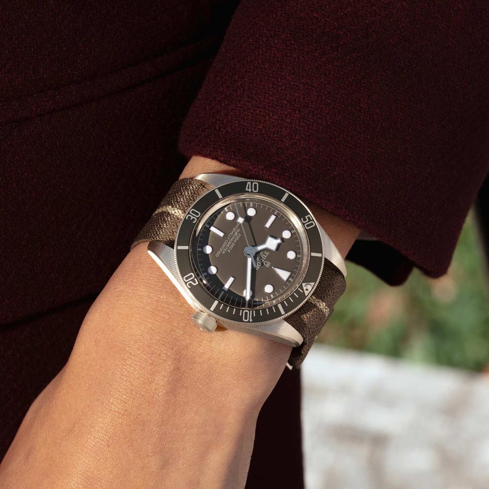 tudor black bay 58 925 39mm taupe dial sterling silver on fabric strap automatic watch lifestyle image