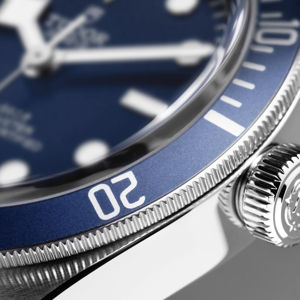 tudor black bay 58 39mm blue dial steel on leather strap automatic watch bezel closeup