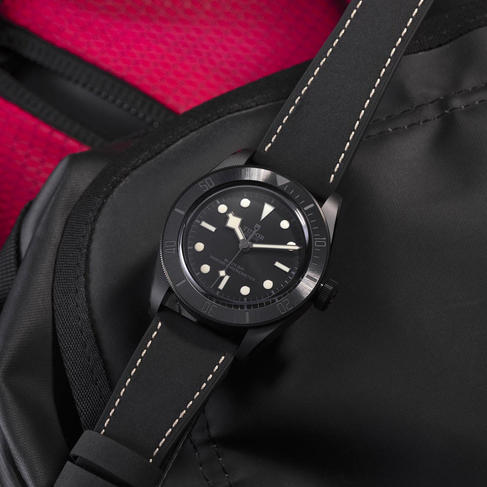 tudor black bay ceramic 41mm black dial ceramic on leather strap automatic watch lifestyle image