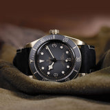 tudor black bay bronze 43mm slate grey dial bronze on leather strap automatic watch lifestyle image