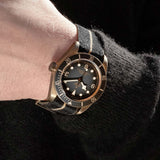 tudor black bay bronze 43mm slate grey dial bronze on fabric strap automatic watch lifestyle image