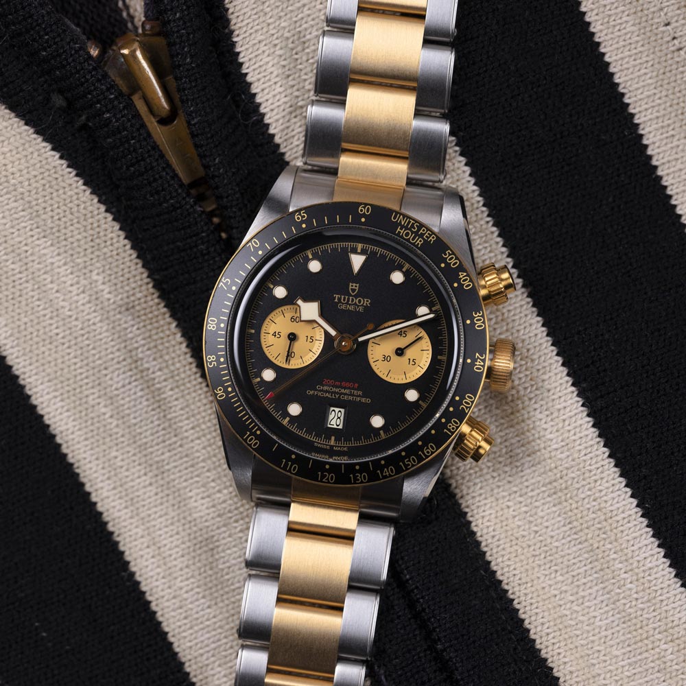 tudor black bay chrono s&g 41mm black dial gold and steel on steel and gold bracelet automatic chronograph watch lifestyle image
