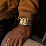 tudor black bay chrono s&g 41mm champagne dial gold and steel on steel and gold bracelet automatic chronograph watch lifestyle image