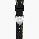 tudor black bay pro 39mm black dial steel on hybrid rubber and leather strap automatic watch showing hybrid rubber and black leather strap with folding clasp