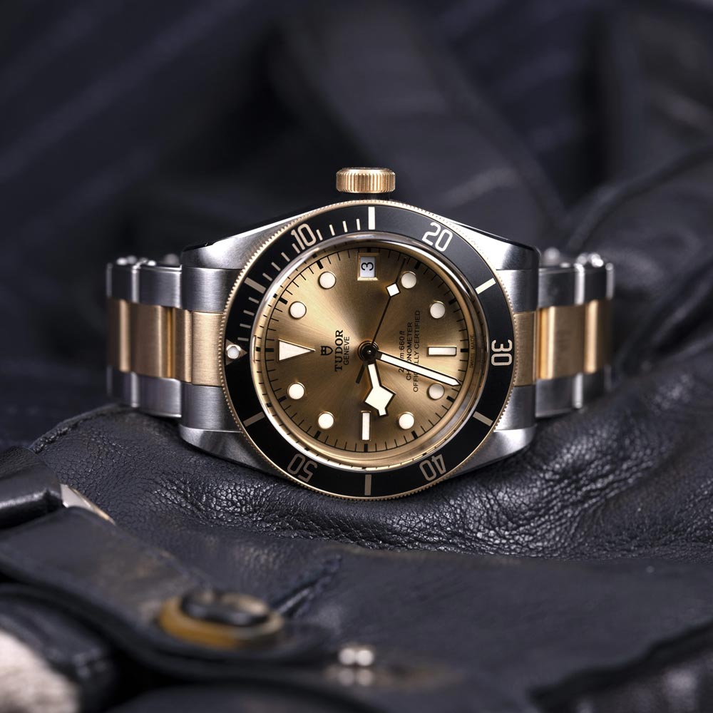 tudor black bay s&g 41mm champagne dial gold and steel on gold and steel bracelet automatic watch lifestyle image