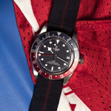 tudor black bay gmt 41mm black dial automatic steel on fabric strap watch lifestyle image