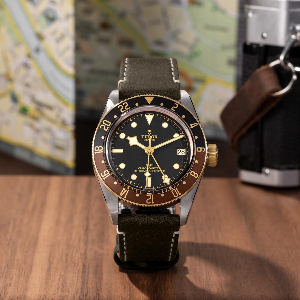tudor black bay gmt s&g 41mm black dial gold and steel on leather strap automatic watch lifestyle image