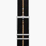 tudor black bay gmt s&g 41mm black dial gold and steel on fabric strap automatic watch showing black fabric strap on a tang buckle