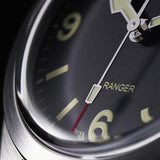 tudor ranger 39mm black dial steel on fabric strap automatic watch showing its dial in closeup