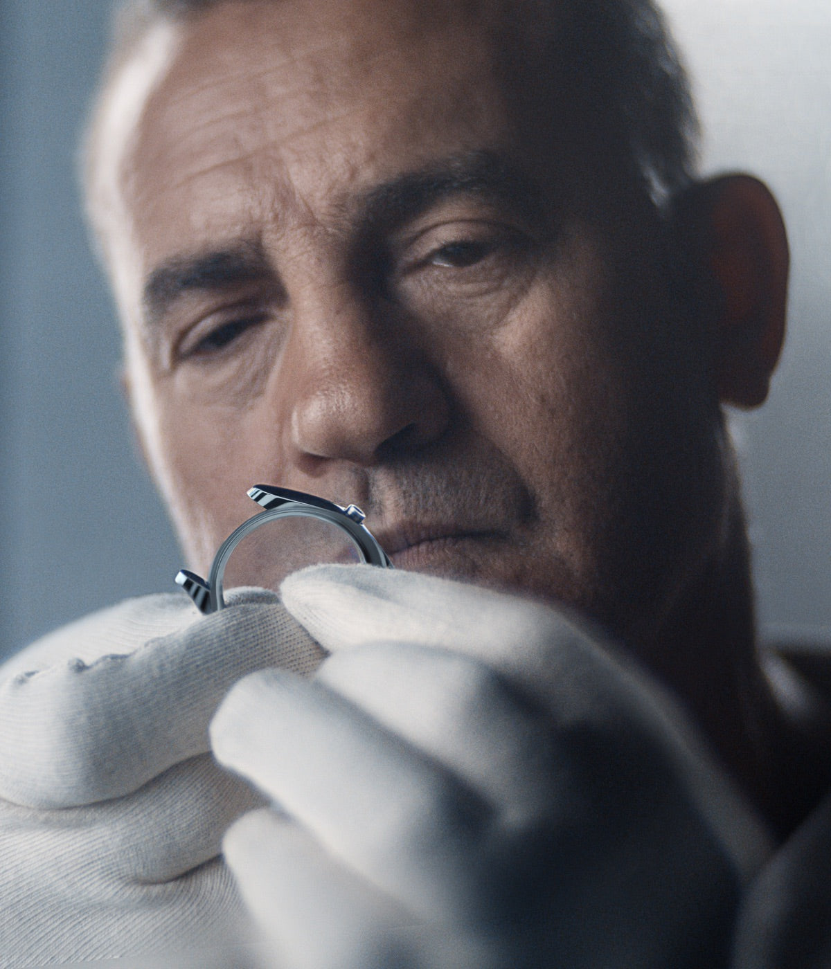 watchmaker is assessing the case landscape image