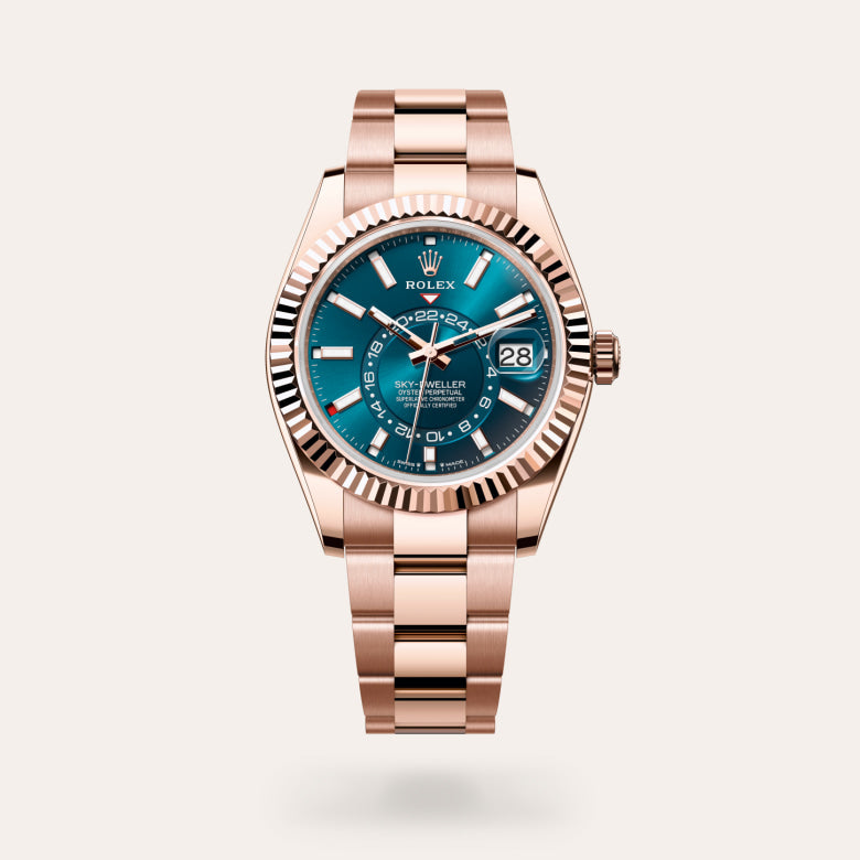rolex sky-dweller, Rose gold watch with a blue dial on a white background upright image for desktop