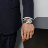 gucci g-timeless 40mm silver dial bicolour gents automatic watch on stainless steel bracelet lifestyle image