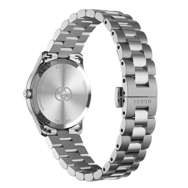 gucci g-timeless 29mm mop diamond dot dial ladies quartz watch on stainless steel bracelet caseback facing upright image