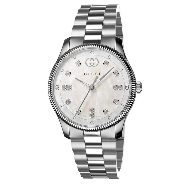 gucci g-timeless 29mm mop diamond dot dial ladies quartz watch on stainless steel bracelet front facing upright image