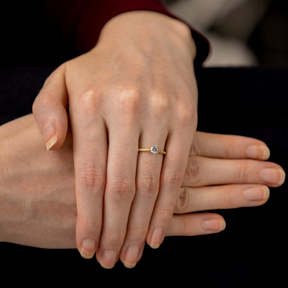 The Jasmine 18ct Yellow Gold 0.41ct Round Brilliant Cut Diamond Solitaire Engagement Ring With 0.10ct Diamond Set Shoulders
