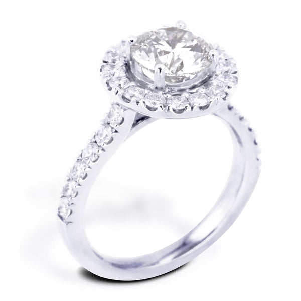 The Rosalia Platinum Round Brilliant Cut Diamond Engagement Ring With Diamond Halo And Diamond Set Shoulders