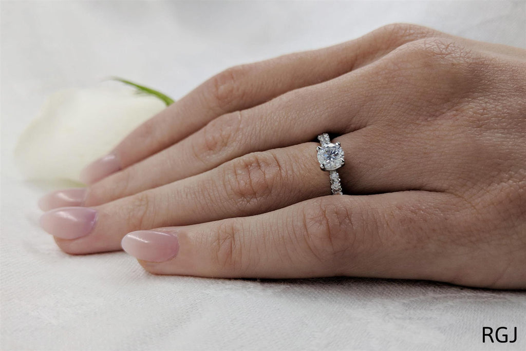 The Skye Classic Platinum Round Brilliant Cut Diamond Solitaire Engagement Ring With Diamond Set Shoulders