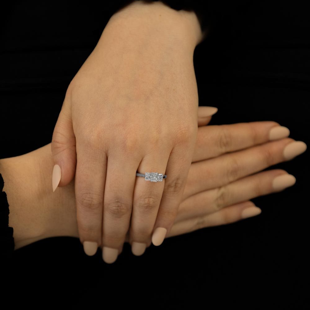 platinum 1.15ct radiant cut diamond three stone engagement ring model shot