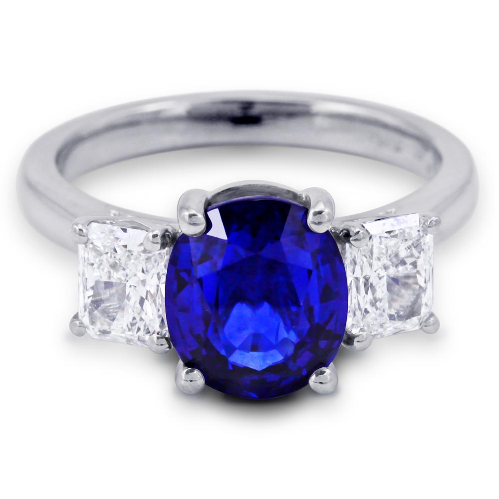Platinum 3.16ct Oval Cut Sapphire And 1.06ct Radiant Cut Diamond Three Stone Ring
