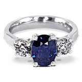 Platinum 2.14ct Oval Sapphire and 0.80ct Diamond Three Stone Engagement Ring