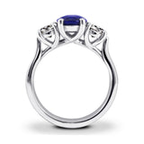Platinum 2.14ct Oval Sapphire and 0.80ct Diamond Three Stone Engagement Ring