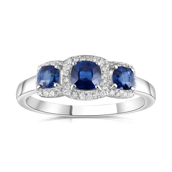 18ct white gold 0.75ct cushion cut blue sapphire three stone ring with 0.11ct diamond halo setting view