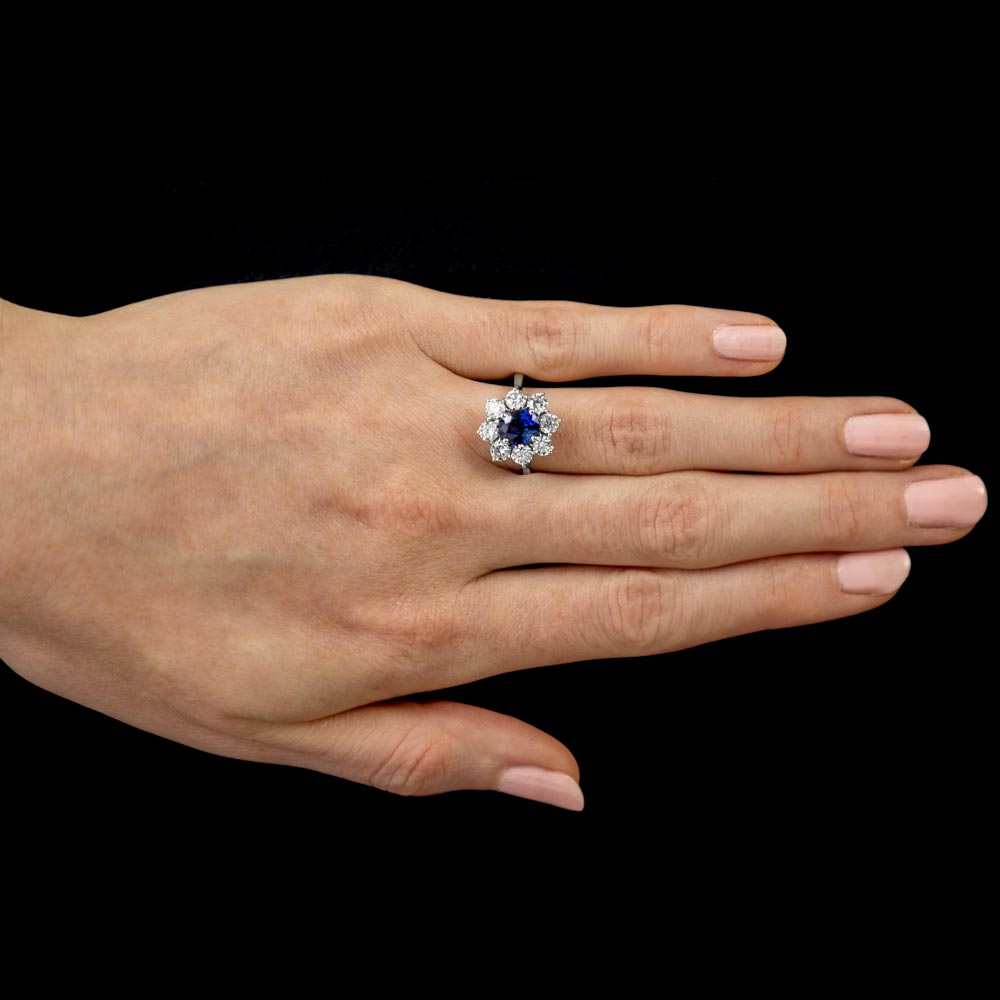 18ct White Gold 1.70ct Oval Cut Blue Sapphire And 1.65ct Round Brilliant Cut Diamond Halo Cluster Ring