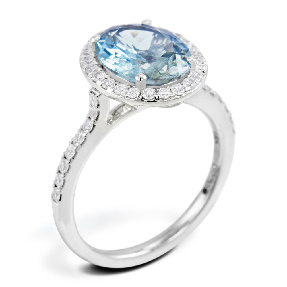 18ct White Gold 2.49ct Oval Cut Aquamarine With 0.40ct Diamond Halo and Diamond Set Shoulders Ring