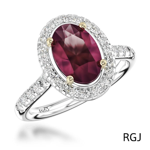 The Skye Platinum And 18ct Yellow Gold 2.13ct Oval Cut Ruby Ring With 0.42ct Diamond Halo And Diamond Set Shoulders