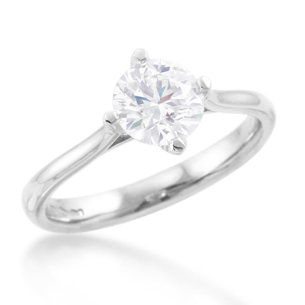 the round brilliant cut compass set platinum lab grown diamond solitaire engagement ring