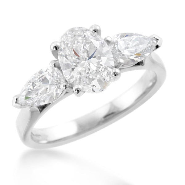 The Oval And Pear Cut Platinum Lab Grown Diamond Three Stone Engagement Ring