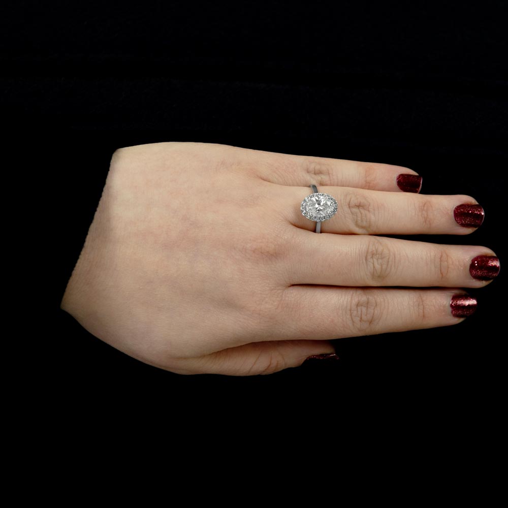 The Oval Cut Platinum Lab Grown Diamond Engagement Ring With Lab Grown Round Brilliant Cut Diamond Halo