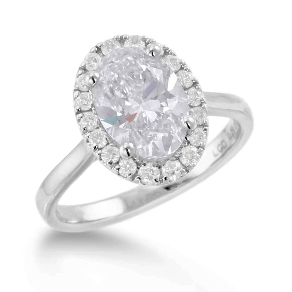 the oval cut platinum lab grown diamond engagement ring with lab grown round brilliant cut diamond halo