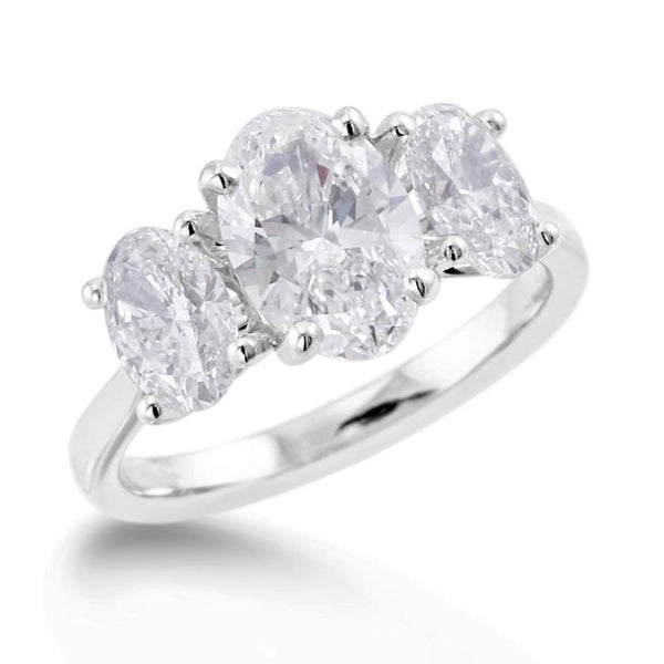 the oval cut platinum lab grown diamond three stone engagement ring
