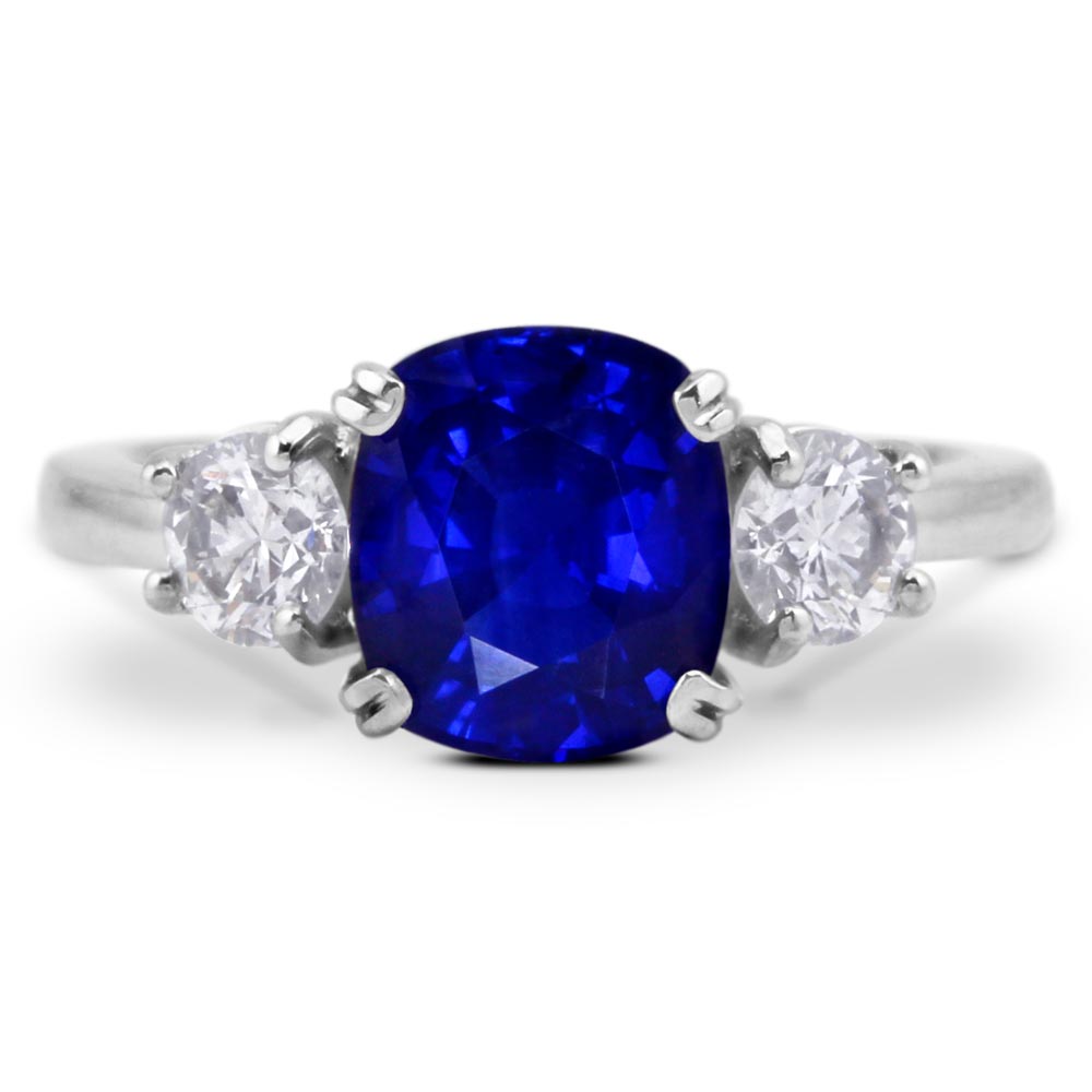 Platinum 3.08ct Cushion Cut Sapphire And 0.50ct Diamond Three Stone Engagement Ring