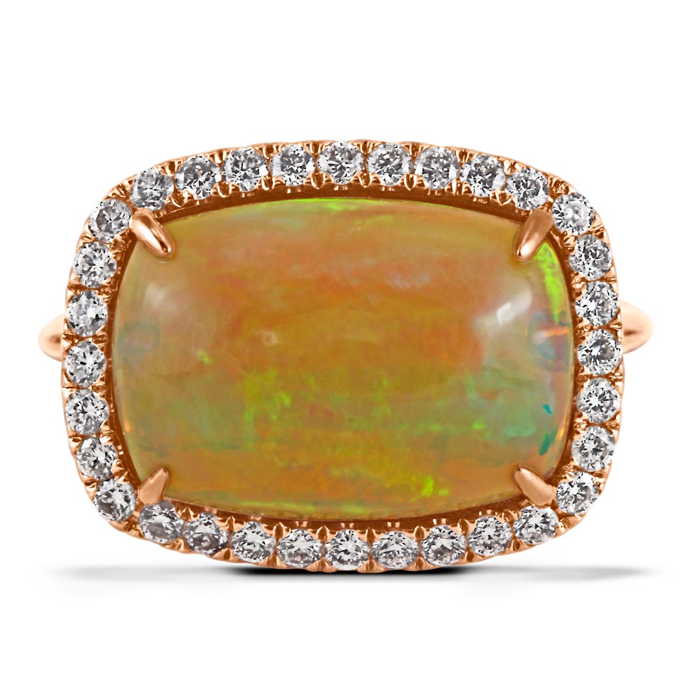 18ct Rose Gold 4.19ct Opal And 0.37ct Diamond Halo Ring