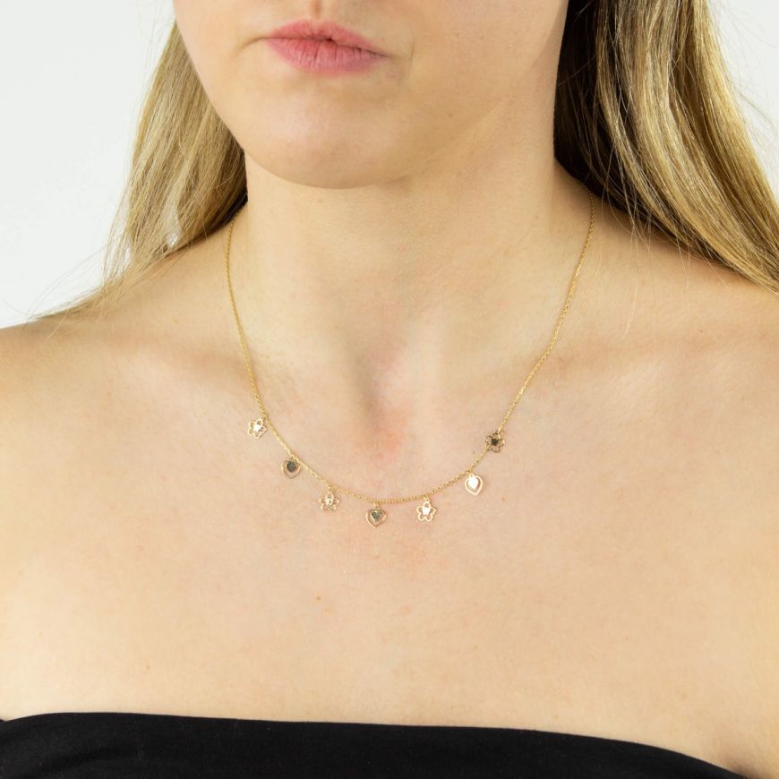 9ct yellow gold hearts and flowers charm necklace model shot