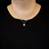 18ct white gold 0.56ct round brilliant cut diamond cluster flower necklace model shot