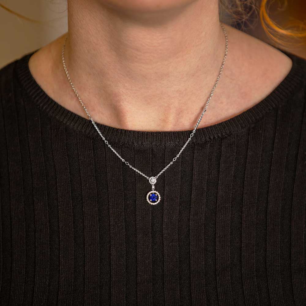 18ct White Gold 0.63ct Sapphire and 0.33ct Diamond Drop Halo Necklace