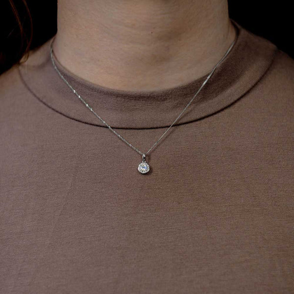 18ct White Gold 0.23ct Moonstone And 0.13ct Diamond Cluster Pendant